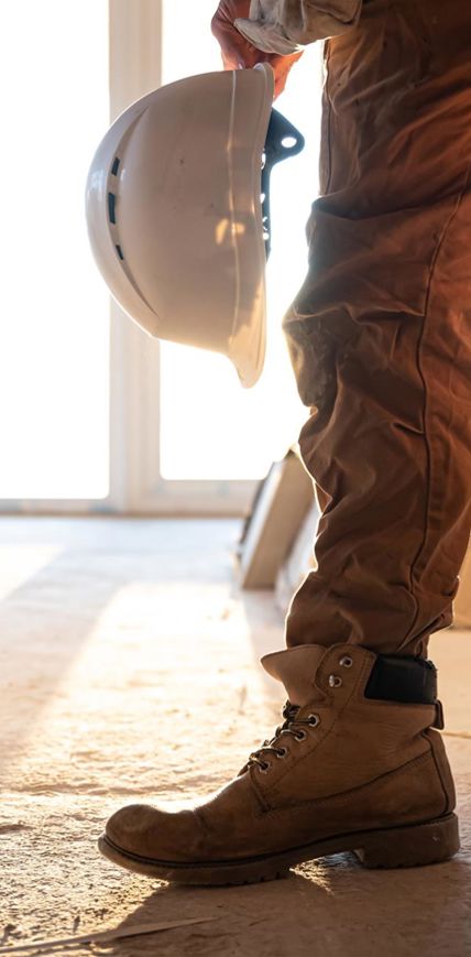 freepik-man-builder-with-helmet-his-hands-copy-space